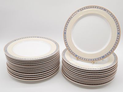 many plates stacked on top of each other on a table