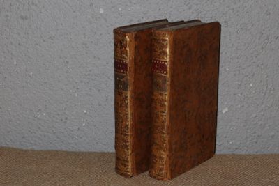 two books that are sitting on a table