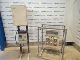 an image of a couple of machines sitting on top of a floor