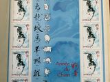 an open book with chinese characters on it sitting on top of a table