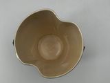 a small bowl that is sitting on a table