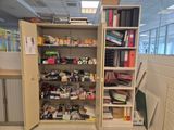 a large open cabinet with many items in it