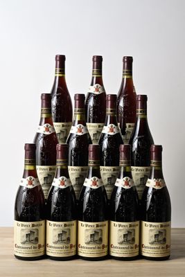 many bottles of wine that are sitting on a table
