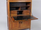 an old wooden desk with drawers and a marble top