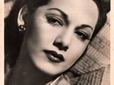black and white photograph of a woman with a necklace on her neck