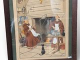 tableau représentant un chat noir assis devant une photo d'une femme et d'un chat