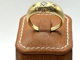an image of a close up of a ring on a wooden box
