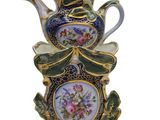 a picture of a decorative vase with flowers on it