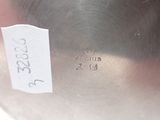 a metal pot with a price tag on it