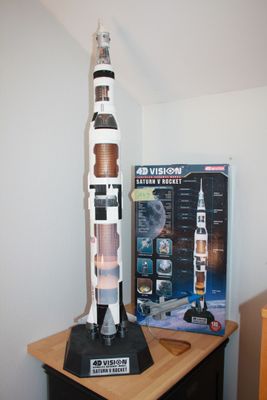 a model of a rocket sitting on a table