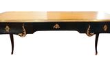 an image of a black and gold desk with two drawers