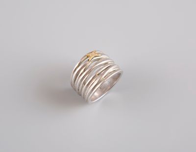 MAUBOUSSIN. Bague en or et argent, modèle Kiff & Kiss, serti…