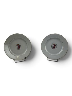 two plates that are sitting next to each other on a table