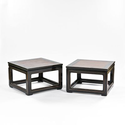 pair of black and gold side tables with marble top
