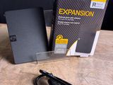 a box and a pair of scissors sitting on a table