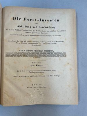 an old book with german text on it sitting on a table