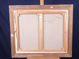 an image of a picture frame on a easel with a piece of paper on it
