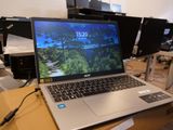 a laptop that is sitting on a table in a room