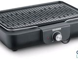 a close up of an electric grill on a white background