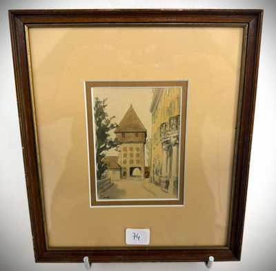 framed picture of a street scene with a building in the background
