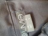 the label on the back of a gray jacket that says levi ' s