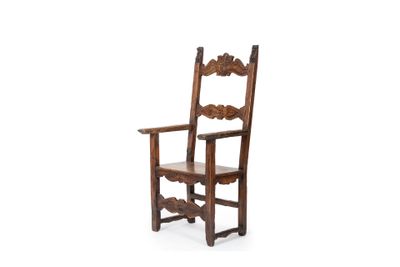 an old wooden chair sitting on top of a white surface