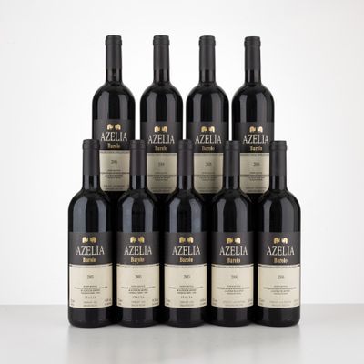 six bottles of red wine are lined up on a table