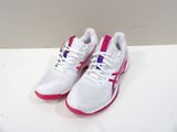 white and pink running shoes on a white surface