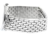 a close up of a watch on a white surface