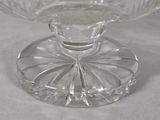 a clear glass bowl with a flower design on it