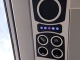 a close up of a speaker on the side of a train