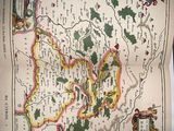 an old map of the kingdom of england in a book
