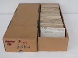 a cardboard box with a lot of mail inside of it