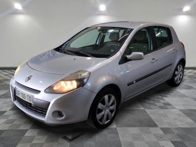 a picture of a silver car parked in a garage