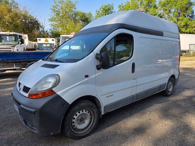 a picture of a white van parked in a lot