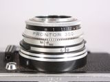 a close up of a camera with a lens attached to it