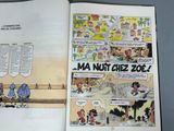 an open book with a picture of a cartoon on it