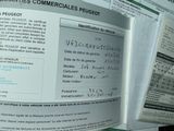 a close up of a document with a picture of a person on it
