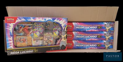 a lot of pokemon cards in a box on the table