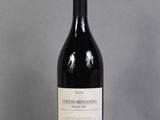a bottle of wine that is sitting on a table