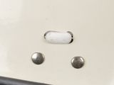 a close up of a button on the side of a car