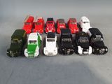 a lot of toy trucks that are lined up together
