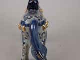 a figurine of a horse with a blue and white design