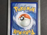 a close up of a pokemon card on a table