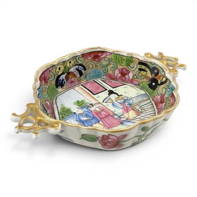 a bowl with a picture of a woman and a man on it