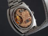 a watch that is sitting on a metal bracelet