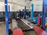 an image of a garage with a lot of equipment in it