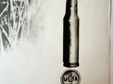 an old picture of a bullet on a paper