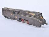 a black toy train on a white background