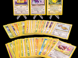 pokemon trading card game set with a lot of cards on a black background